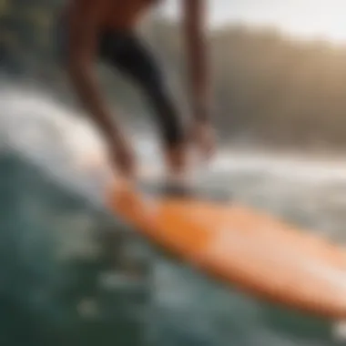 Customizing Fins for Enhanced Surfing Experience Surfer customizing surfboard fins for optimal performance