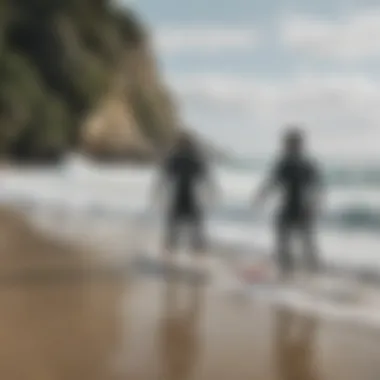 Surf instructor teaching a beginner