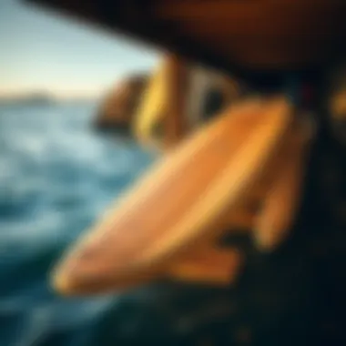 Storage solution for collapsible paddle boards in a compact space