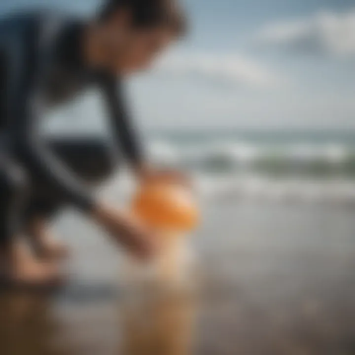 Person applying vinegar to a jellyfish sting site