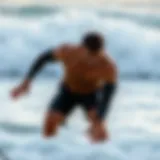 Surfer practicing lung capacity exercises on the beach