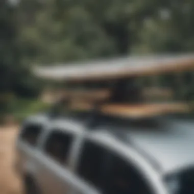 FCS roof straps securing surfboards on a vehicle roof