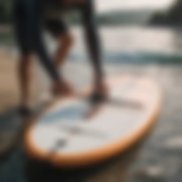 Foldable paddle board being packed for transport