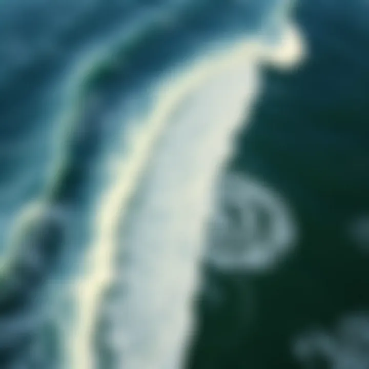 Aerial view of Huntington Beach coastline with waves