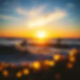 Sunset over Huntington Beach with surfers catching waves