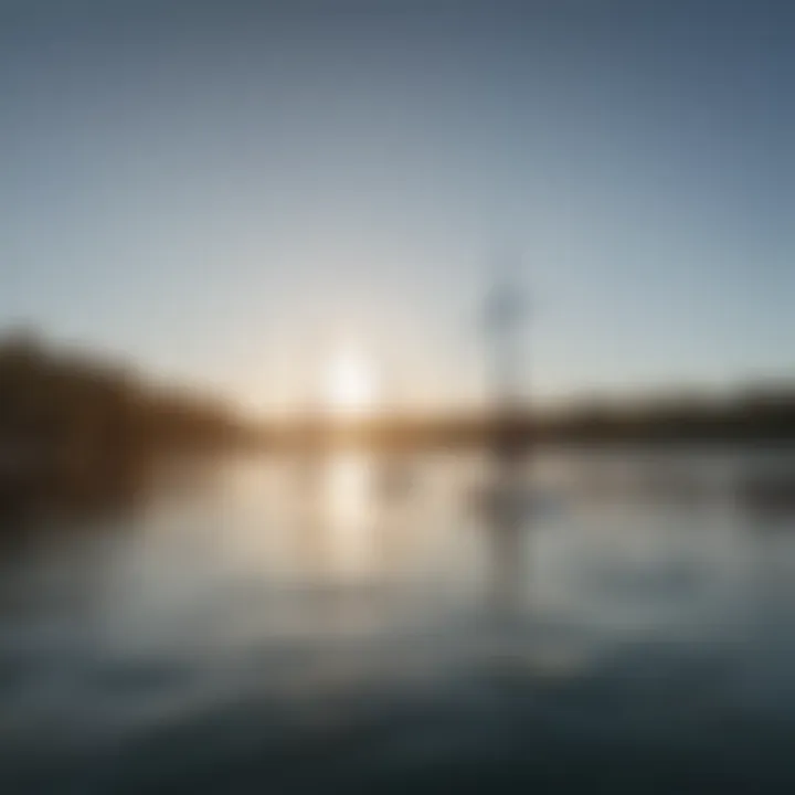 Paddle board with sail on a tranquil lake