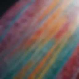 Close-up view of a vibrant resin tint surfboard showcasing intricate patterns.