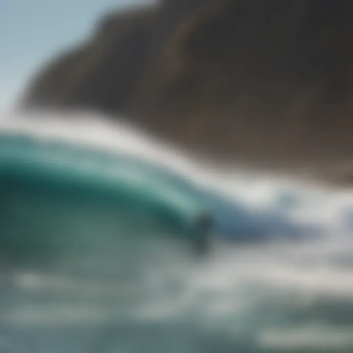 Dynamic coastline with surfers enjoying the waves