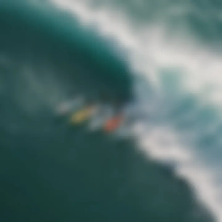 An aerial view showcasing a group of SUP surfers riding waves