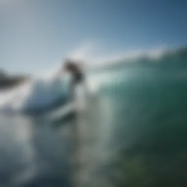 Surfer riding a wave at Manresa beach