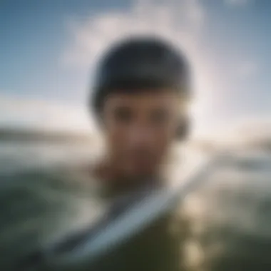 Surfing enthusiast adjusting a GoPro hat mount for optimal filming