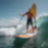 A vibrant inflatable paddleboard gliding over ocean waves