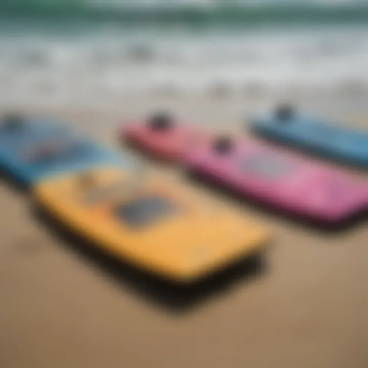 Close-up view of various boogie boards lined up, highlighting their unique designs