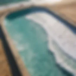 Aerial view of a modern surf wave pool showcasing the artificial waves.