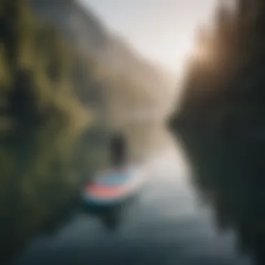 A tranquil lake scene showcasing an inflatable SUP gliding smoothly on calm waters.