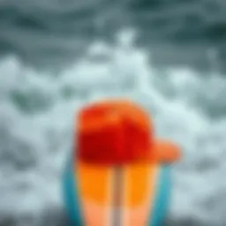 A vibrant surf naked hat resting on a surfboard against a backdrop of crashing waves