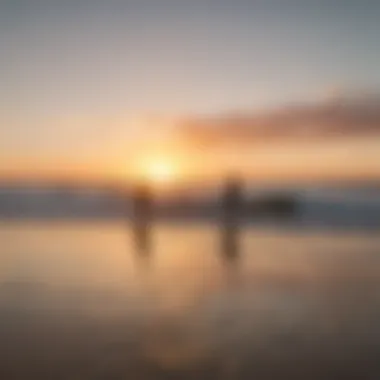 Surfers catching waves during sunset at one of Lisbon's popular beaches