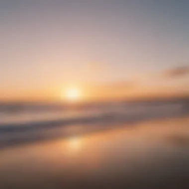 Crowded beach scene at Pacific Beach during sunset