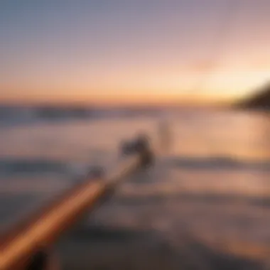 A picturesque sunset view with the Ugly Stik Surf Rod in the foreground