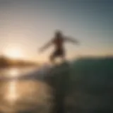 A skimboarder gliding across the water at sunset