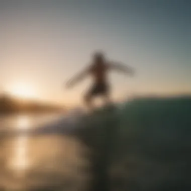 A skimboarder gliding across the water at sunset