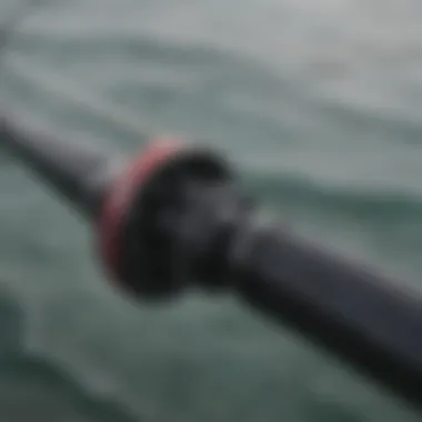 Close-up view of the Ugly Stik surf rod showcasing its unique reel seat and guides.