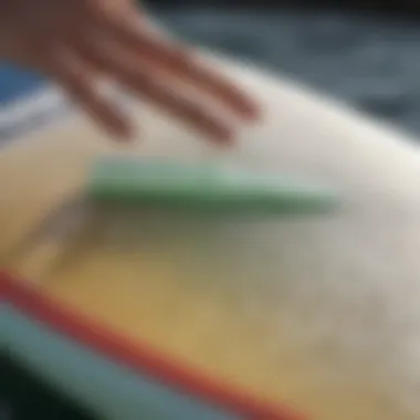 A product shot of Zip Wax on a surfboard