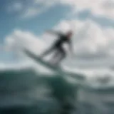 A rider gracefully gliding above water on a foilboard