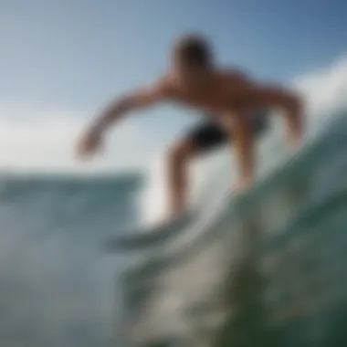 Surfer using the Garmin Surfing Watch while catching a wave