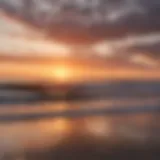 A breathtaking view of Hossegor's surf beach at sunset with surfers catching waves.