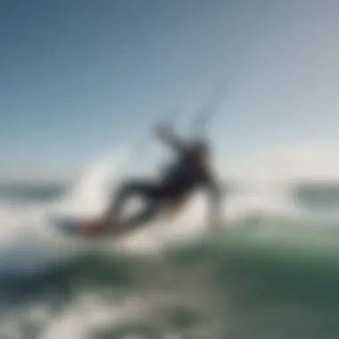 Kitesurfers riding the waves with clear skies