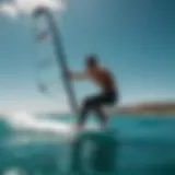 A wing foiling athlete gliding over turquoise waters