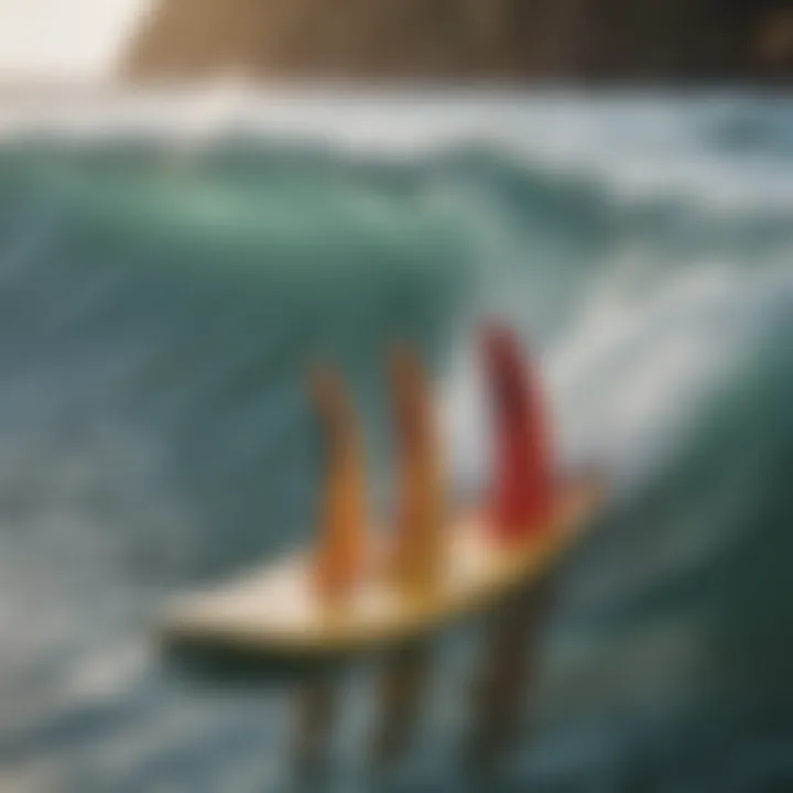 Close-up of surfboard fins in the water