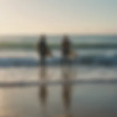 Group of surfers discussing techniques on the beach