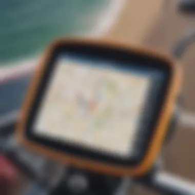 Close-up of GPS device displaying a map and direction