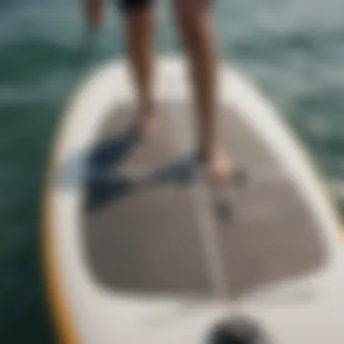 A close-up of a paddleboard showcasing various widths