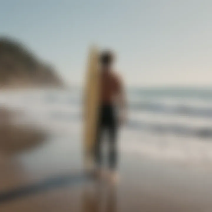 Fashionable surfer showcasing a Saint Laurent surfboard on the beach