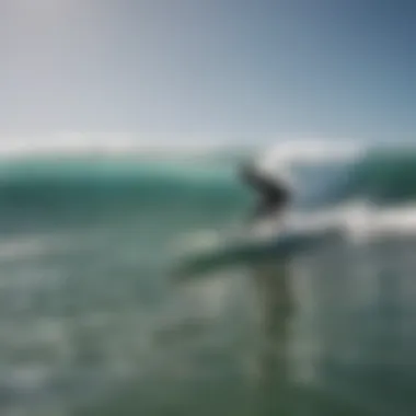 Surfer riding a wave with a perfectly sized surfboard