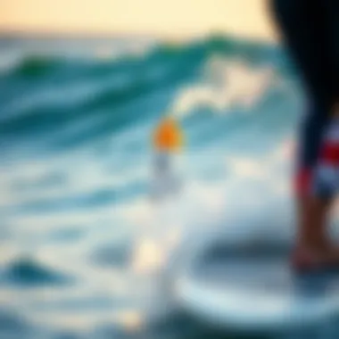 A surfer enjoying the waves with the anti-shark spray visible on their board