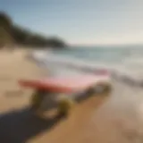 A vibrant foam longboard displayed on a sunny beach