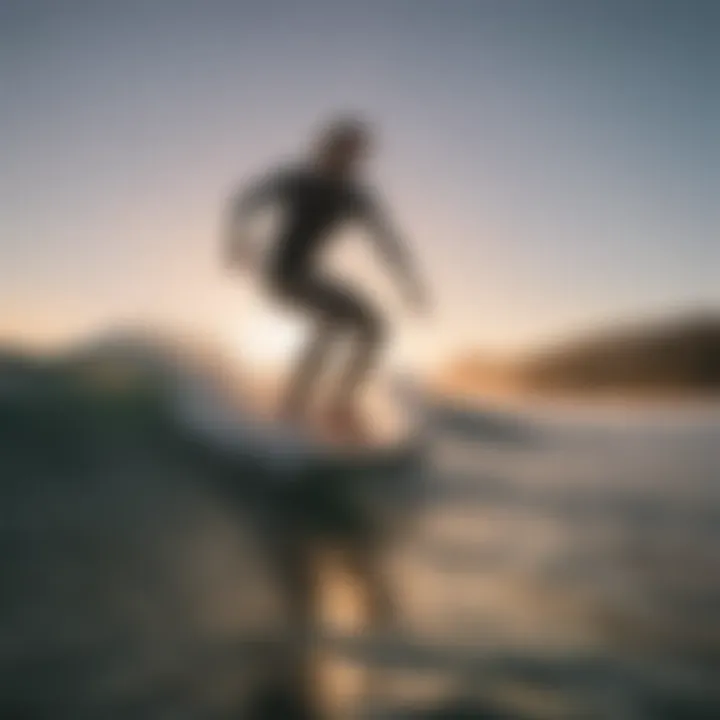 Surfer enjoying efoiling at sunset