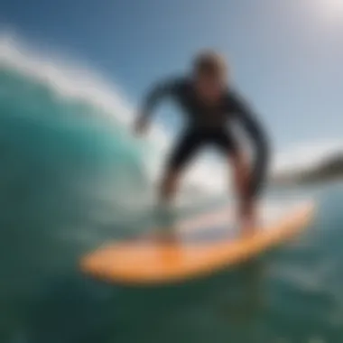 Surfer demonstrating a surf pad on a board