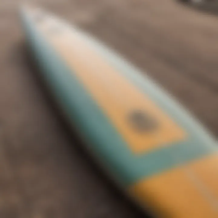 A close-up of a surfboard resting on a yoga mat, symbolizing the connection between the two practices.