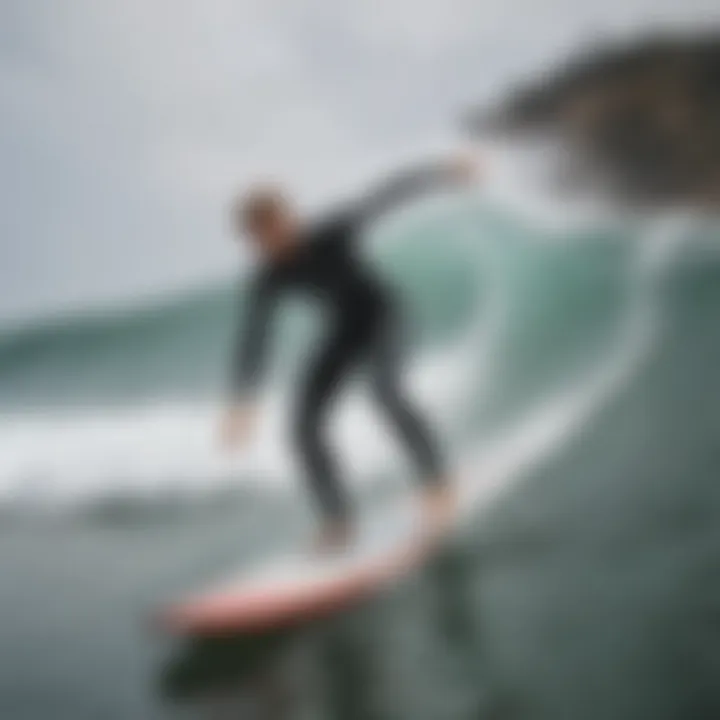 An experienced instructor demonstrating surfing techniques