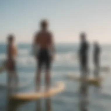 Expert surfer discussing fin selection techniques with a group