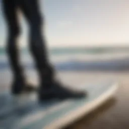 Wetsuit booties displayed on a surfboard