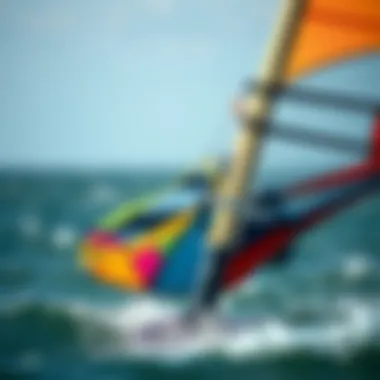 Close-up of a colorful windsurfing sail in action